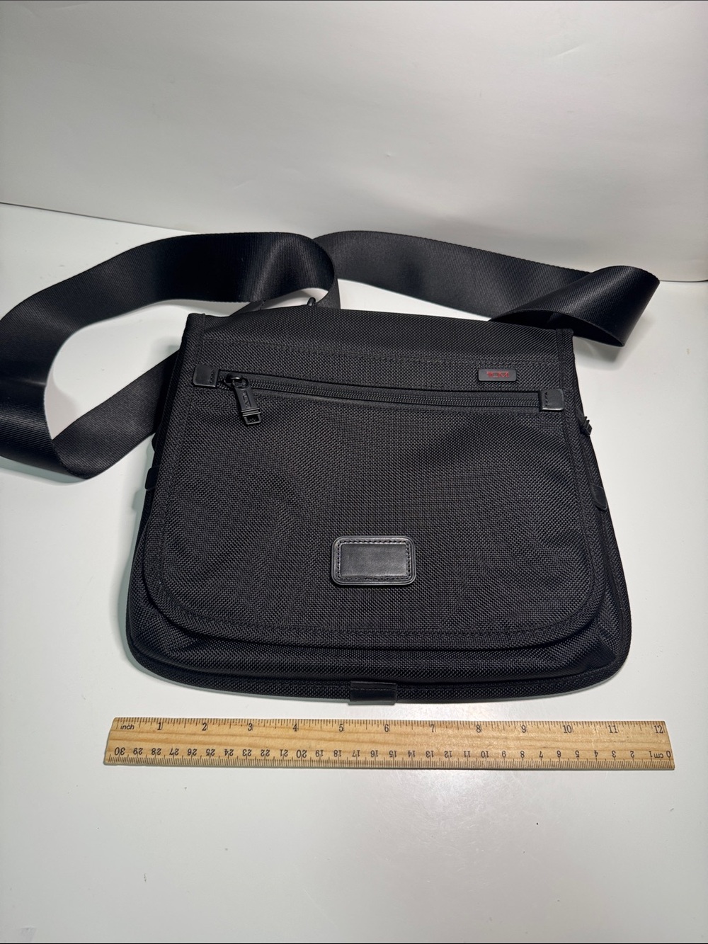 Tumi black crossbody bag excellent condition